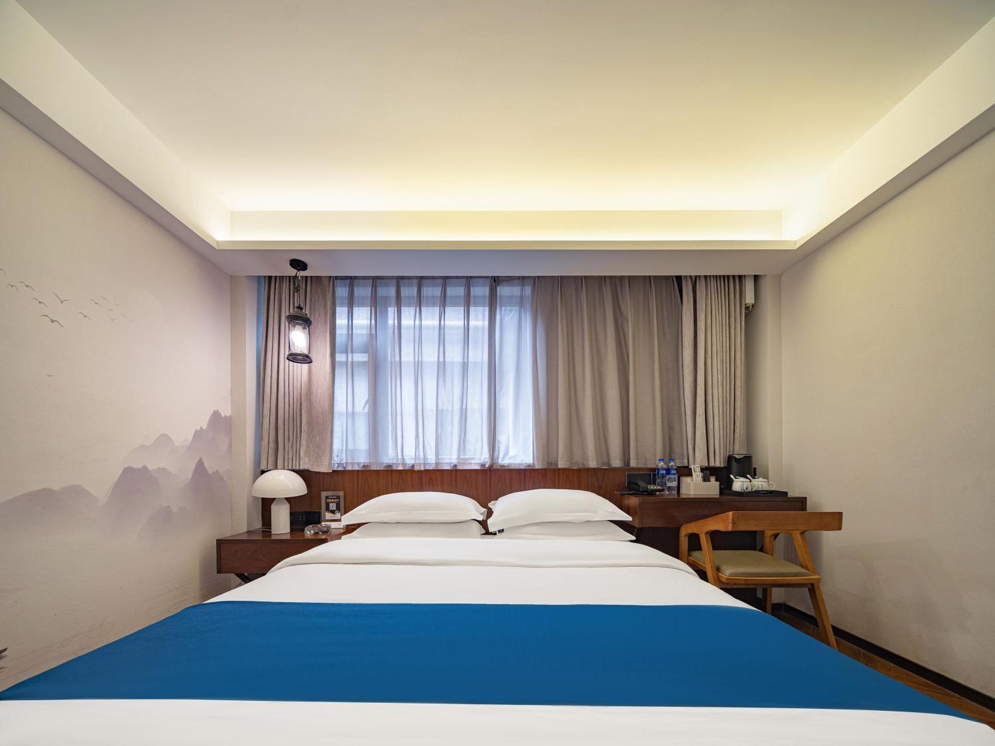 張家界武陵源北岸輕奢客棧 森林公園店 Hotel Csangcsiacsie Kültér fotó