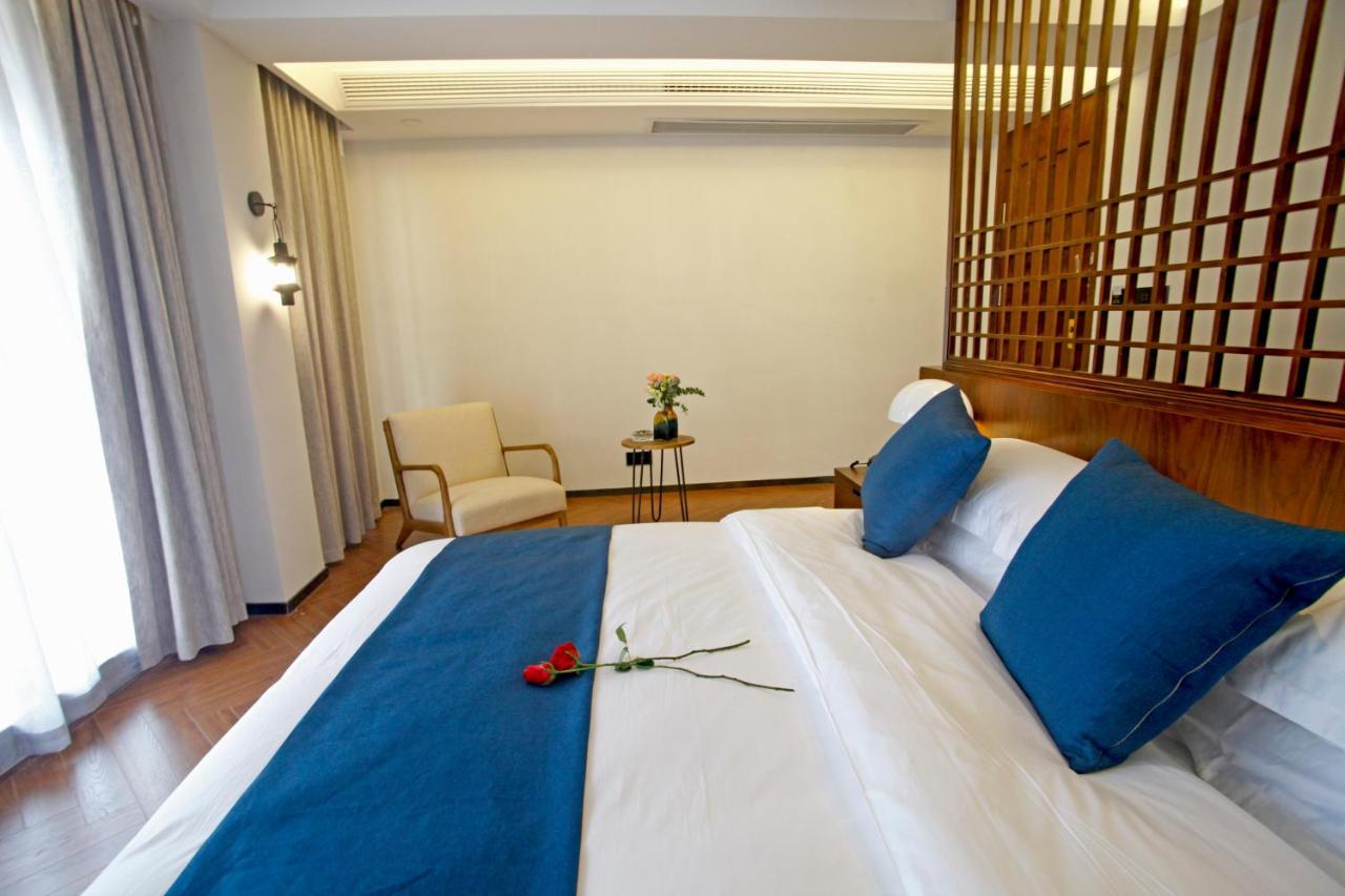 張家界武陵源北岸輕奢客棧 森林公園店 Hotel Csangcsiacsie Kültér fotó